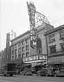The Orpheum Theatre with advertising for the movie Lady Luck ; note the Commodore Ballroom on the left. circa 1946