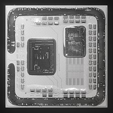 Um Ryzen 5 5600X sem tampa. Apenas um CCD está presente. Os contatos para um segundo CCD são visíveis.