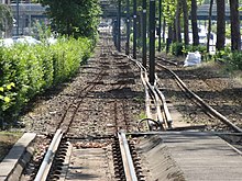 Photo du ballast de la voie ferrée du tramway de Lille-Roubaix-Tourcoing, la voie ferrée a été enlevée pour les travaux.