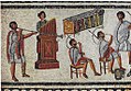 Image 33Musicians playing a Roman tuba, a water organ (hydraulis), and a pair of cornua, detail from the Zliten mosaic, 2nd century AD (from Culture of ancient Rome)