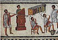 Image 40Musicians playing a Roman tuba, a water organ (hydraulis), and a pair of cornua, detail from the Zliten mosaic, 2nd century AD (from Culture of ancient Rome)