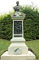 Bust and bas relief monument in Coupvray.