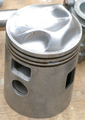 Piston cu deflector, de motor in doi timpi.