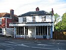 The old Hurst Green post office on the A21. (East Sussex, UK)