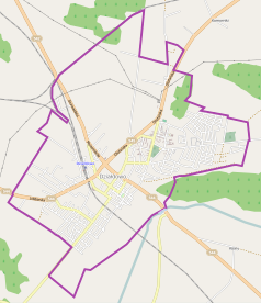 Mapa konturowa Działdowa, blisko centrum na dole znajduje się ikonka zamku z wieżą z opisem „Zamek w Działdowie”