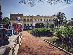 Fire-damaged facade of the palace completely restored, September 2022. View from the new garden