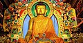 Buddhism is practiced by 31% of the population. Shown here is a statue of the Buddha in the region.