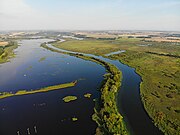 Peene bei Anklam. Links das größte Torfstichgebiet an der Peene mit 1,2 km².