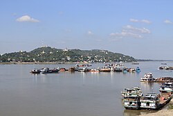 View of Sagaing Township (including Sagaing Hill) from the Yadanabon Bridge