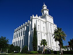 The St. George Temple from a distance looking up at the southeast corner, showing battlements and parapets, and the cupola. Taken before undergoing the 2019–2023 renovations, taken in 2006.