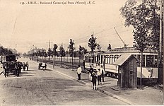 Ancienne carte postale du Grand Boulevard au niveau du poste d'octroi.