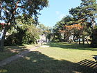 Park zw. Ernst-Grube- und O.-Geschke-Str. mit einer Bronzeskulptur Familie