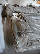 A boar, which animals were used as heraldic supporters by the Courtenay Earls of Devon, serves as the footrest to the effigy of Elizabeth Courtenay at Porlock Church