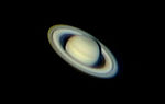 Saturn photographed using negative projection (Barlow lens) with a Philips Tou Webcam attached to a 250mm Newtonian telescope. It is a composite images made from 10% of the best exposures out of 1200 images using freeware image stacking and sharpening software (Giotto)