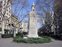 A Joan Güell i Ferrer (1888), de Joan Martorell i Rossend Nobas, Gran Via de les Corts Catalanes amb Rambla de Catalunya.