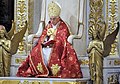 غفَّارة بابوية حمراء، مرتديها البابا بنديكتوس السادس عشر مع برطل.