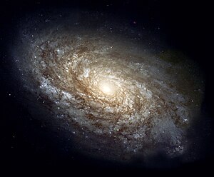 גלקסיית NGC 4414 כפי שצולמה על ידי טלסקופ החלל האבל בשנת 1995.