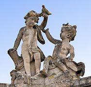 Towards the castle: children with birds. Air.