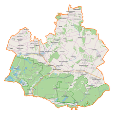 Mapa konturowa powiatu janowskiego, po prawej nieco na dole znajduje się punkt z opisem „Dzwola”