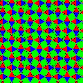 One of the colorings of the snub square tiling; the glide reflection lines are in the direction upper left / lower right; ignoring colors there is much more symmetry than just pg, then it is p4g (see there for this image with equally colored triangles)[5]
