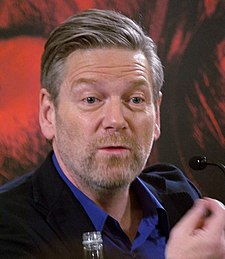 Kenneth Branagh na tiskové konferenci k filmu Thor v roce 2011