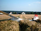 Eine Schleicher K 8 nach Außenlandung im Kornfeld. KW 26 (ab 23. Juni 2013)