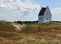 Башта Захороненої церкви (дан. tilsandede kirke) височіє над піщаною дюною