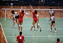 Women competing at volleyball