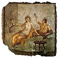 Image 72A late Republican banquet scene in a fresco from Herculaneum, Italy, c. 50 BC; the woman wears a transparent silk gown while the man to the left raises a rhyton drinking vessel (from Culture of ancient Rome)