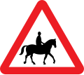 Accompanied horses or ponies likely to be in or crossing the road