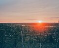 Sunset over upper Eastmain River from Otish Mountains