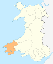 Njegova lega je določena s sodobnimi upravnimi mejami Walesa