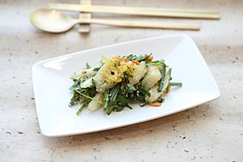 Deodeok-yuja salad, a lance asiabell root salad with a yuja-cheong-based dressing