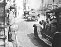 Image 48A Tokyo taxi driver indicating a fare of 50 Sen by holding up five fingers, in 1932 (from Transport in Greater Tokyo)