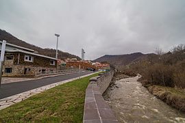 The campus is situated along a flowing river