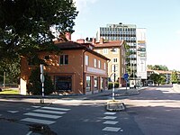 Fastigheter på den södra sidan av Stockholmsvägen vid Torsvik. Vy mot väster. Foto: Augusti 2009.