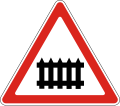Railway crossing ahead that is protected by automatic gates
