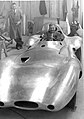 Founder Bill Woodhall sat in a Vanwall VW6 Streamliner at Abbey Panels (c.1956).