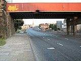 Wakefield Road, Bradford, looking south up the A650 road. This bridge used to carry the Bowling to Laisterdyke line.