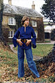 Image 48English girl in the mid-1970s wearing a wide-sleeved shirt, belted at the waist. (from 1970s in fashion)