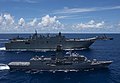 Image 7HMAS Canberra, a Canberra class landing helicopter dock, and HMAS Arunta, an Anzac-class frigate, sailing in formation (from Australia)