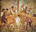 Image 14A multigenerational banquet depicted on a wall painting from Pompeii (1st century AD) (from Roman Empire)