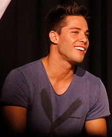 Dean Geyer at an event organised by Young Storytellers Foundation at a school in Culver City, 21 October 2012