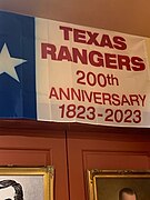Flag Commemorating Bicentennial of the Texas Rangers hang in Texas Ranger Museum