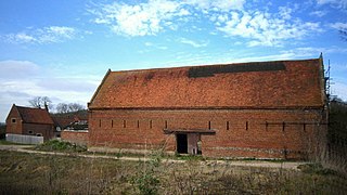 The barn, with farmhouse to the left