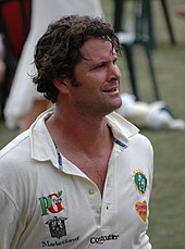 Chris Cairns in white cricket shirt