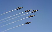 India Five SEPECAT Jaguars of Indian Air Force in arrow formation fly over Rajpath, on the occasion of the 67th Republic Day Parade, in New Delhi (2016)