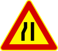 Road narrows on left