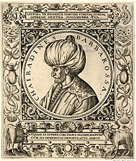 Profile of a bearded man in a turban surrounded by an ornate frame