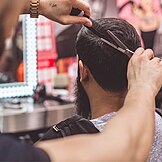 Barber cutting hair